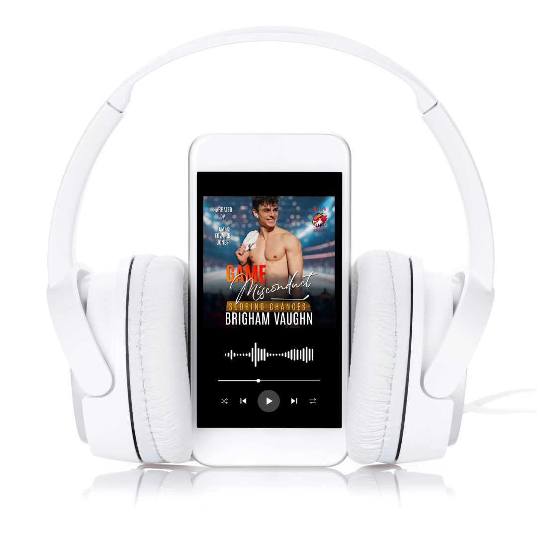 White over the ear headphones with phone screen displaying audio controls and the Game Misconduct by Brigham Vaughn audiobook cover.