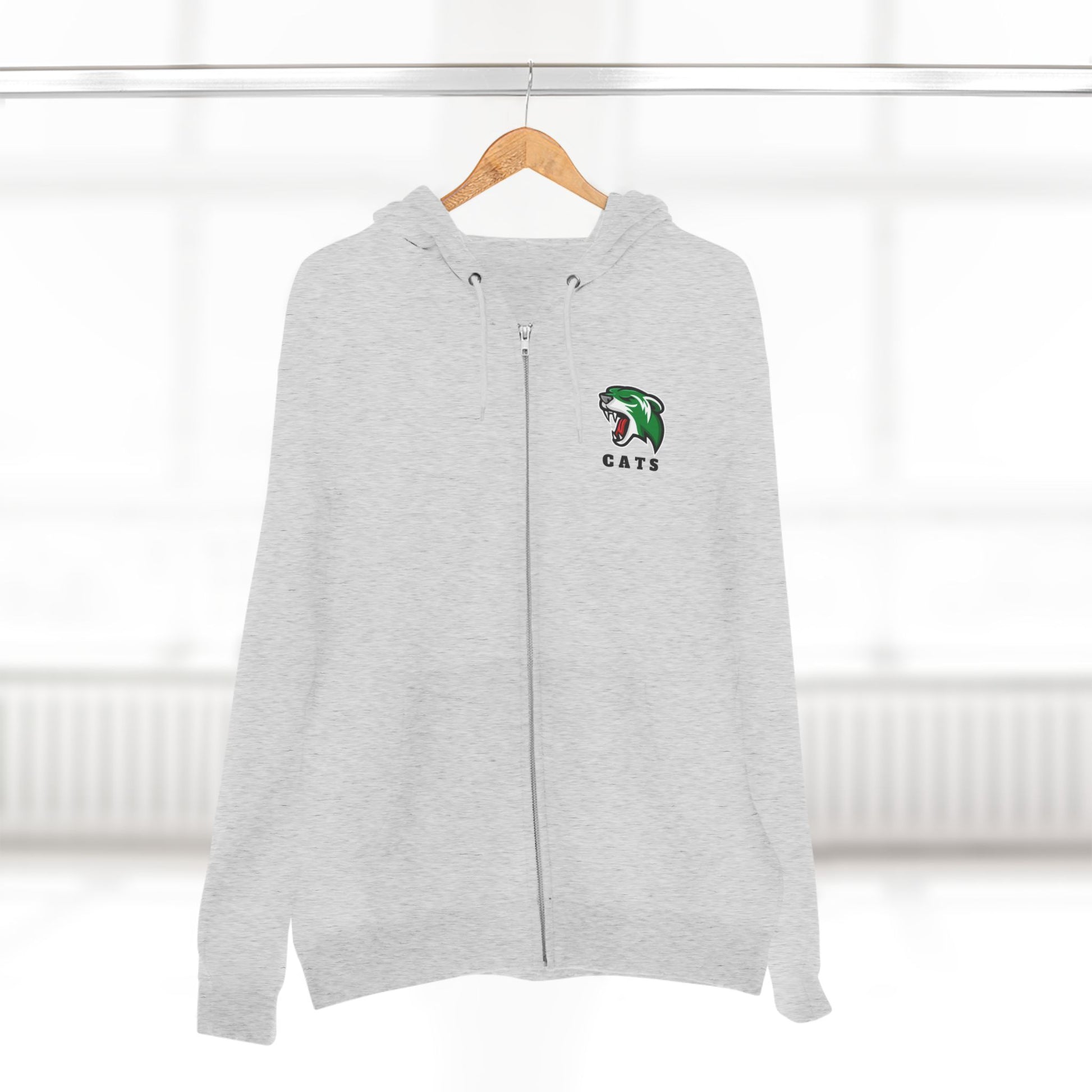 Heather Grey Noah Boucher Toronto Fisher Cats Zip Hoodie on wooden hanger. Blurry white room in background