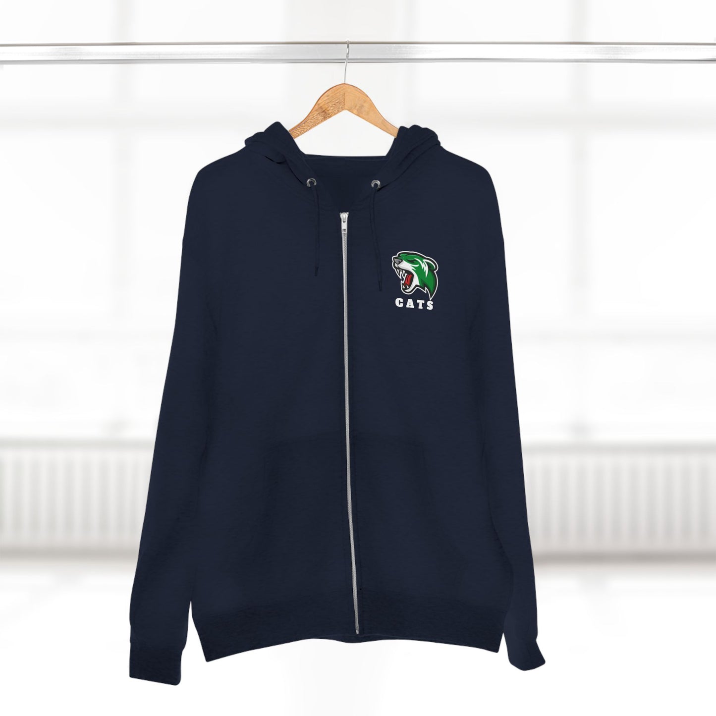 Navy Noah Boucher Toronto Fisher Cats Zip Hoodie on wooden hanger. Blurry white room in background