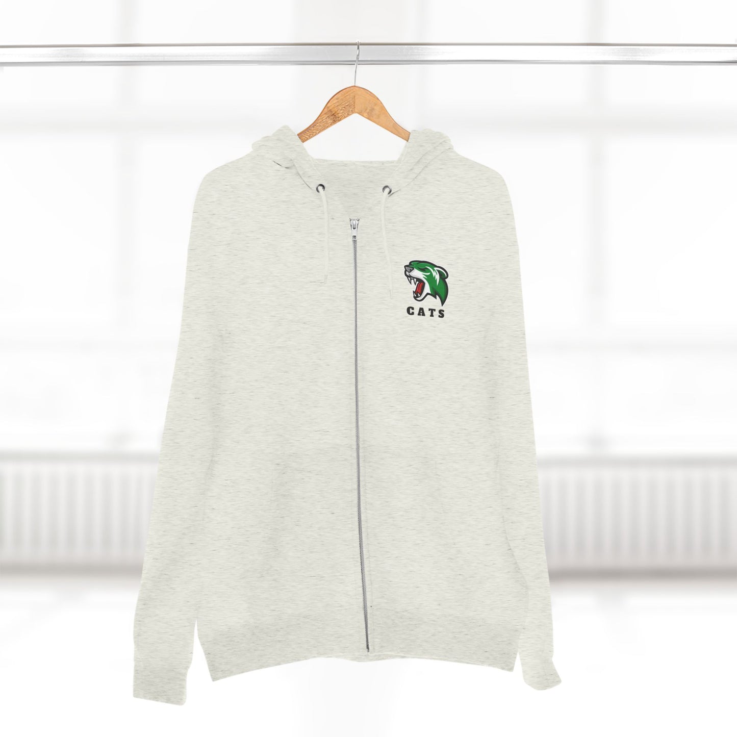 Oatmeal Heather Noah Boucher Toronto Fisher Cats Zip Hoodie on wooden hanger. Blurry white room in background 
