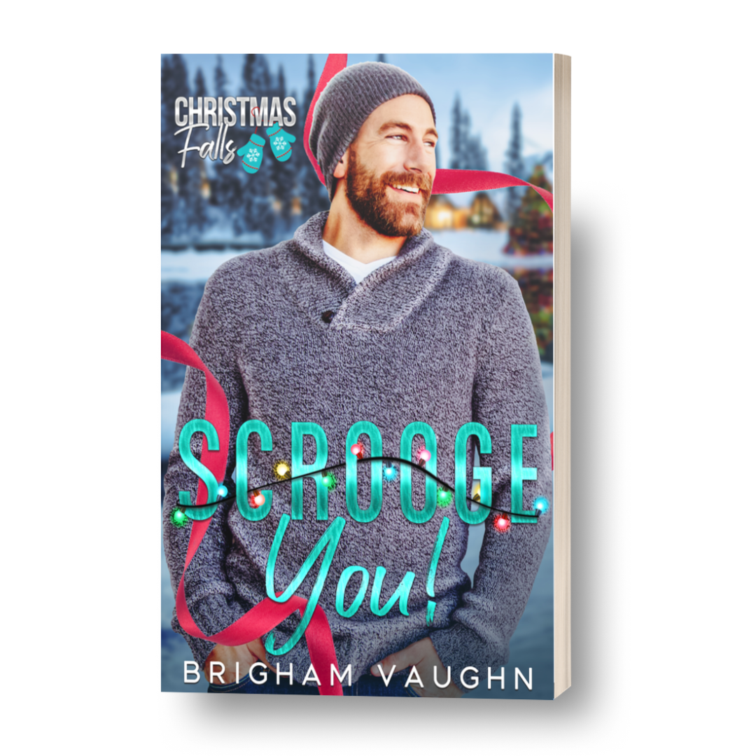 3D mockup of Scrooge You! paperback featuring a man in a grey sweater with a ginger beard. Text saying Scrooge You! by Brigham Vaughn. Background of snowy winter scene