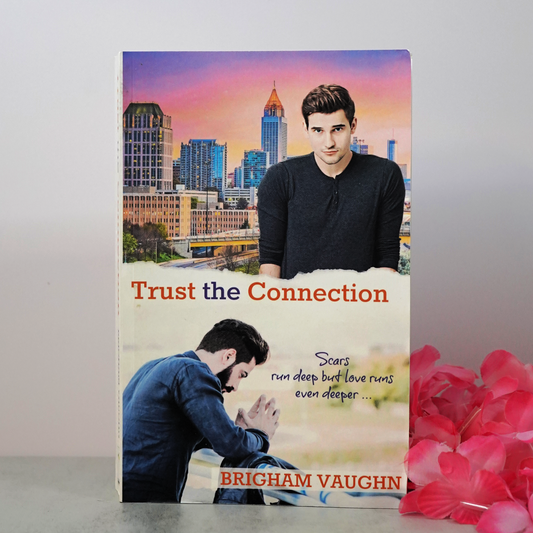 Signed paperback book of 'Trust the Connection' by Brigham Vaughn with pink flowers and white background