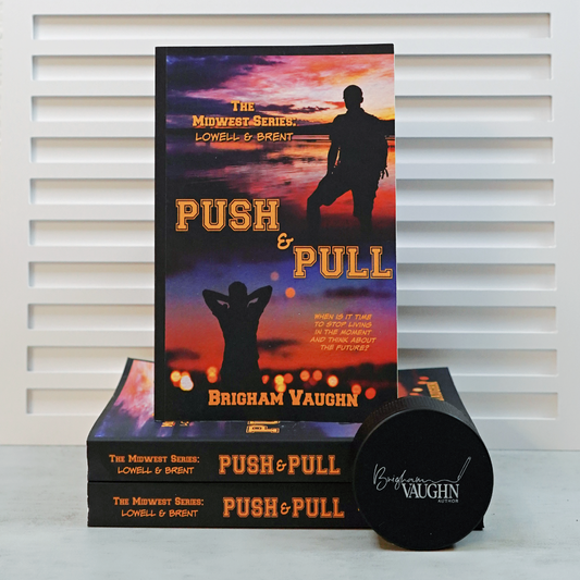 Signed paperback titled 'Push & Pull' by Brigham Vaughn with a hockey puck and white background.