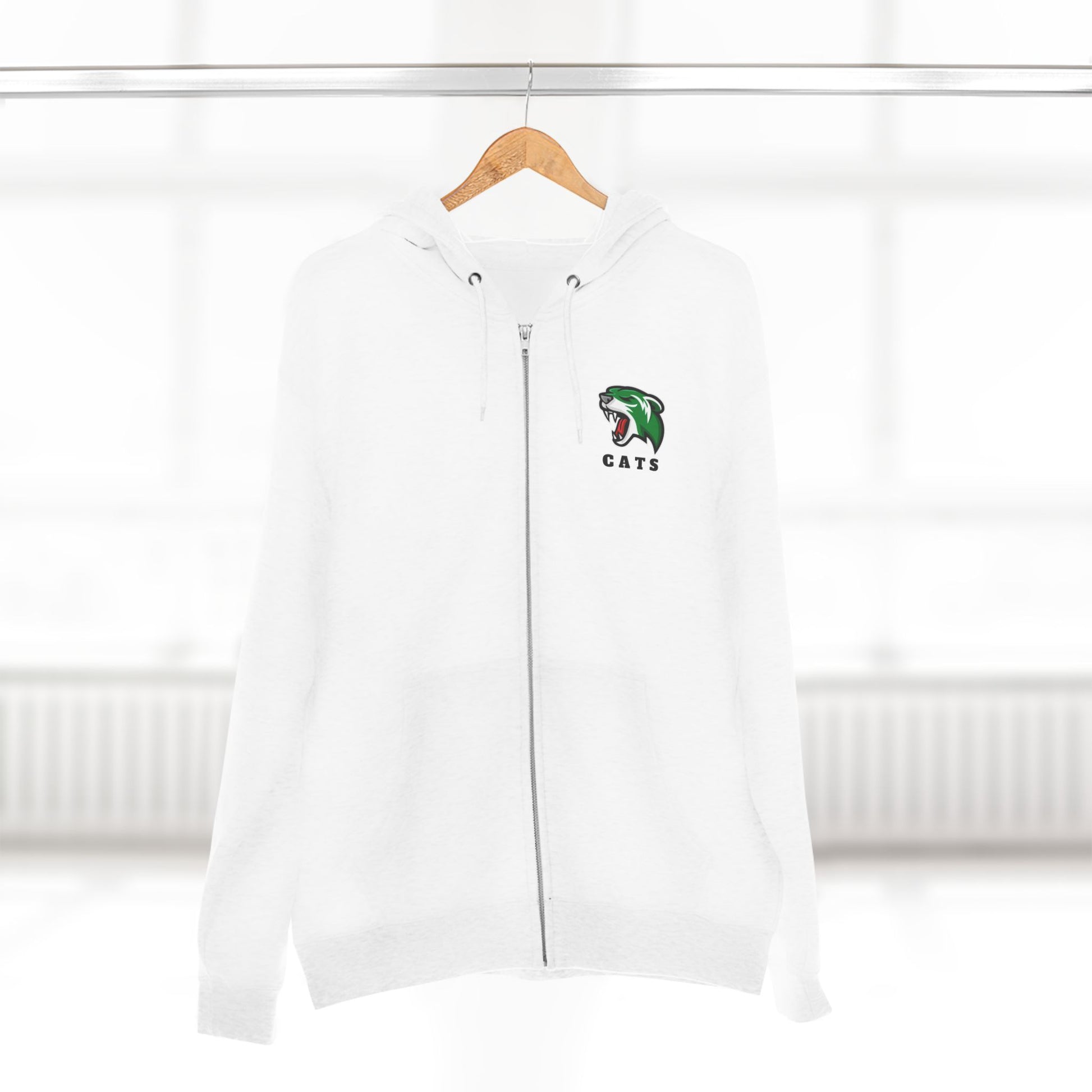 White Noah Boucher Toronto Fisher Cats Zip Hoodie on wooden hanger. Blurry white room in background